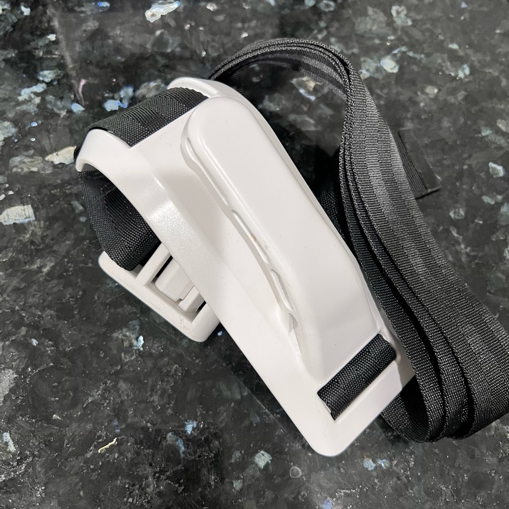 Maternity seatbelt adjuster